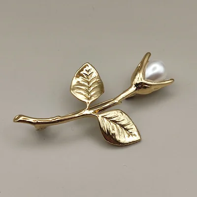 گل سینه مدل شاخه گل مرواریدی