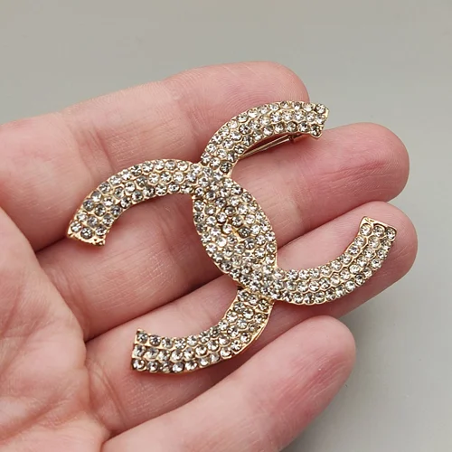 گل سینه مدل شنل فول نگین