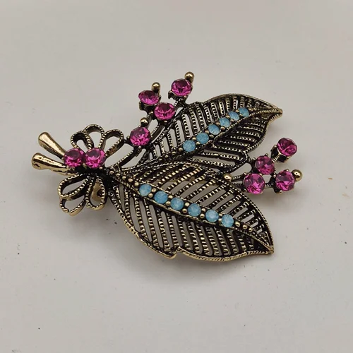 گل سینه مدل دو برگ