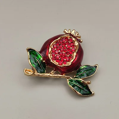 گل سینه مدل برگ و انار