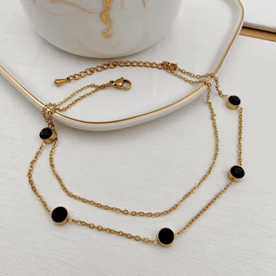 پابند استیل با سنگ های مشکی